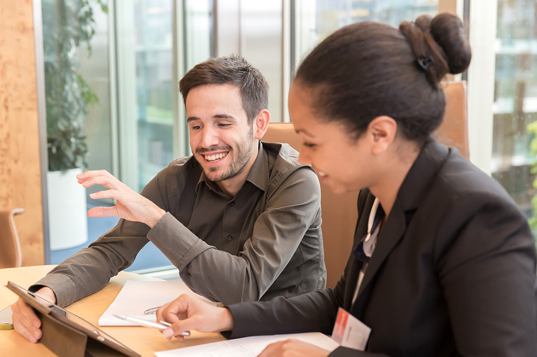 Miguel Casteleiro discussing strategy in a working session